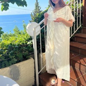 White/ ivory maxi dress with slip dress underneath.